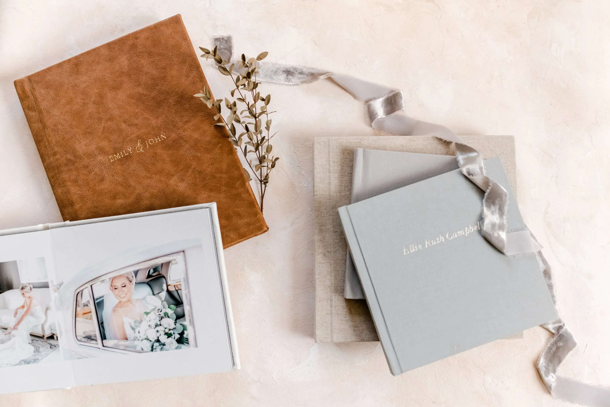 Step 1: Choose your Cover Color in Linen or Leather The cover of your album is a big decision! So many choices, whether you choose leather or linen I love them both! For main album and parent albums there is an additional charge of $125.00 for the Luxe Leather I and II. If you choose Luxe Linen there is a $60.00 additional charge. All the Luxe upgrades do not apply for the Lite Albums.