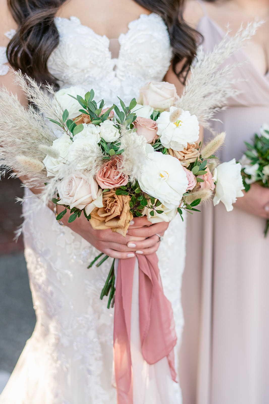 Romantic bridal bouquet with soft beige and ivory flowers captured by New Jersey wedding photographer