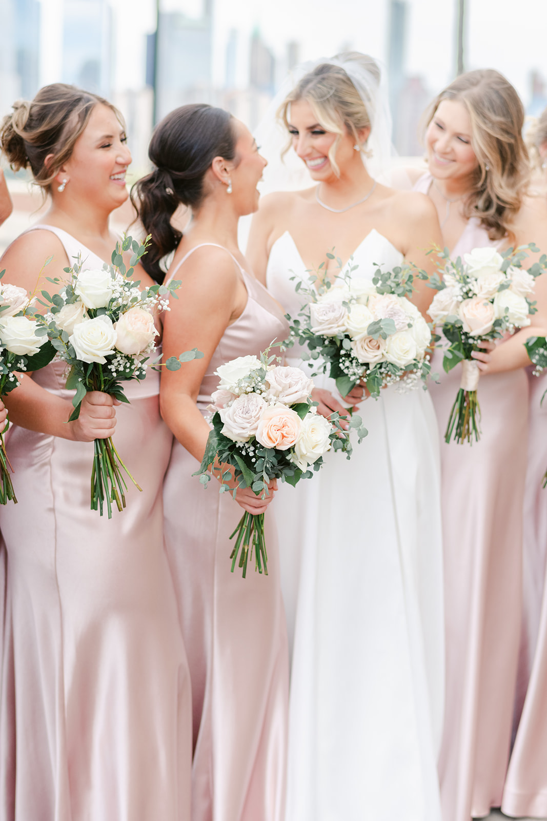 Timeless bridal bouquet with ivory roses and soft greenery