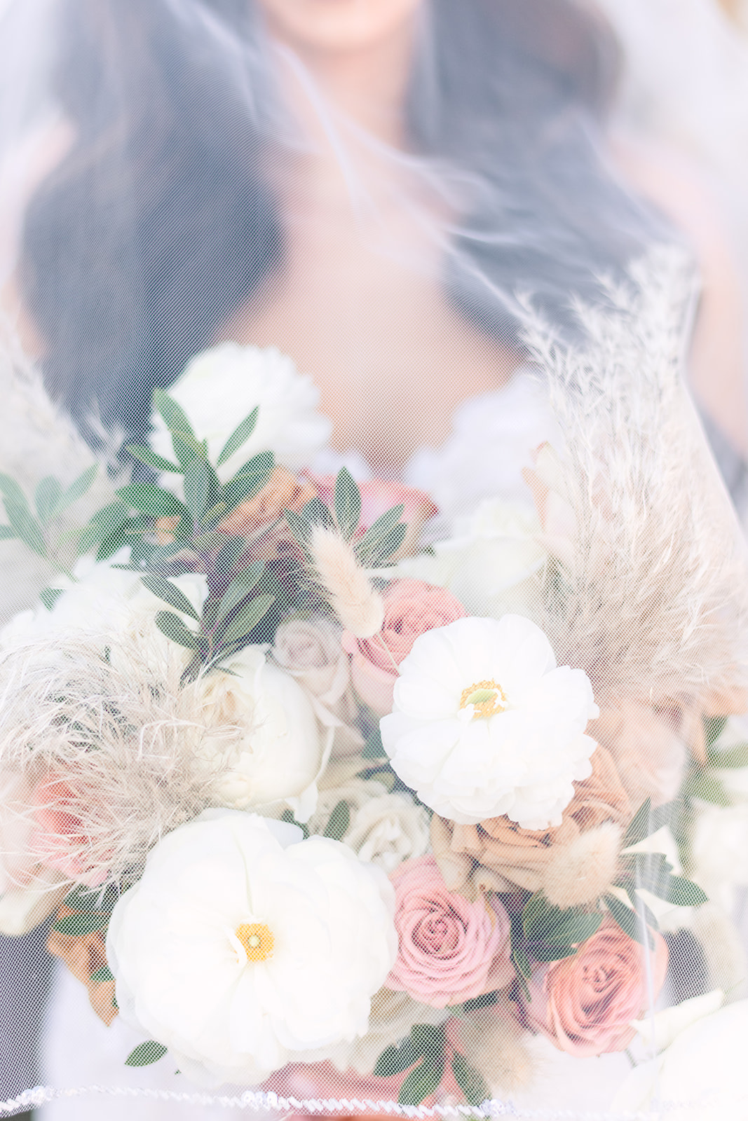 Elegant neutral bridal bouquet detail featuring subtle greenery at a New Jersey wedding