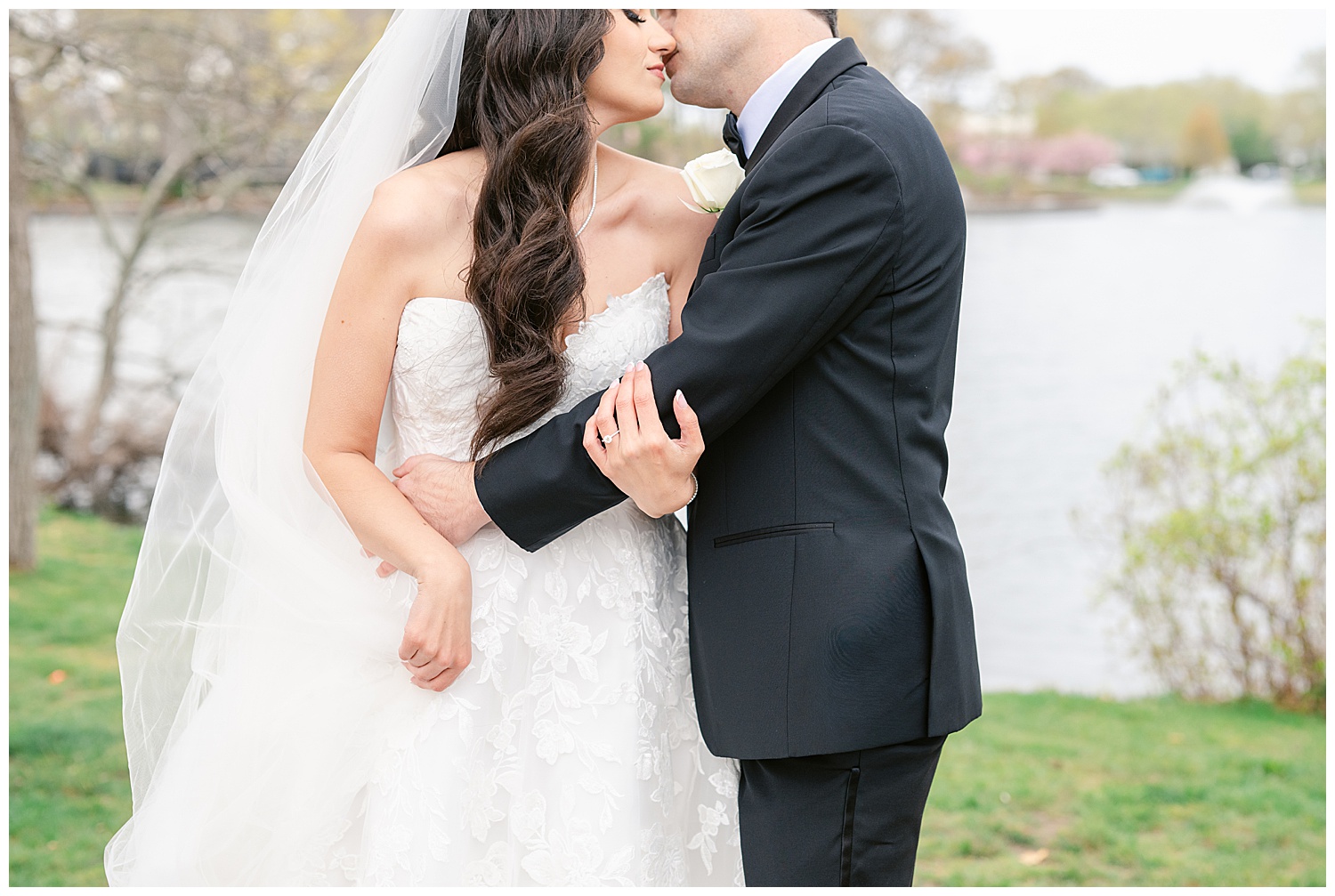 Spring Lake NJ wedding couple on bridge cherry blossoms