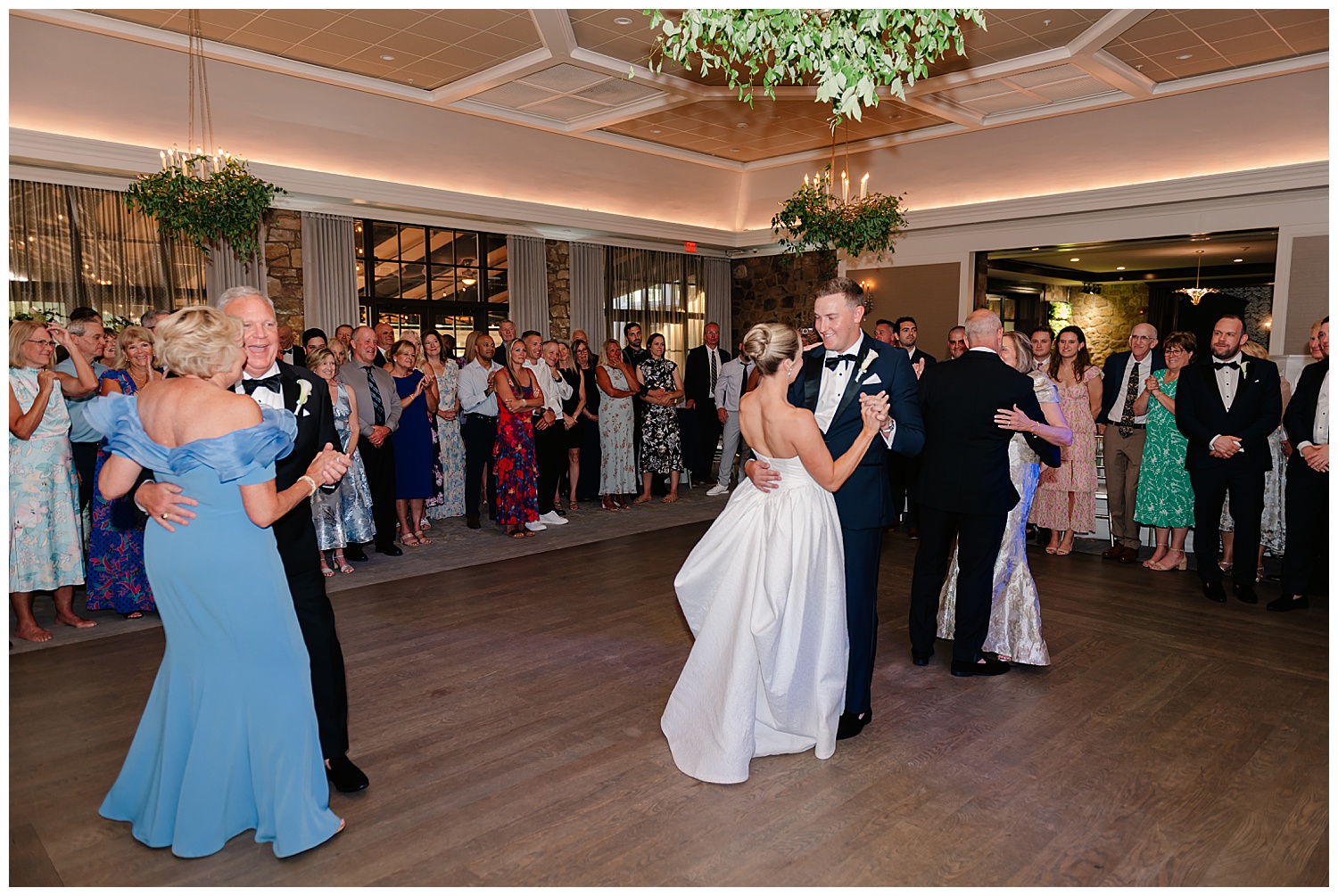 Guests lined up on dance floor during first dance at Fiddler's Elbow Country Club