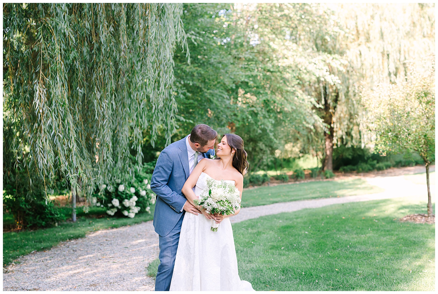 bride and groom hugging portrait