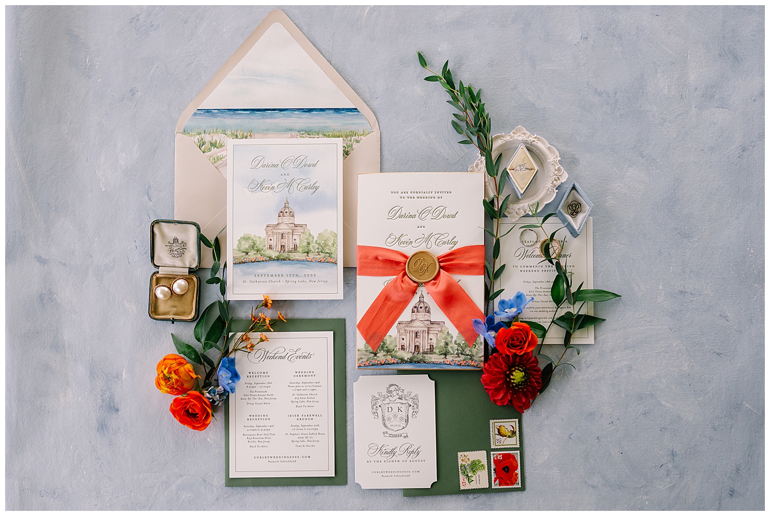 pretty blue and orange wedding invitation suite