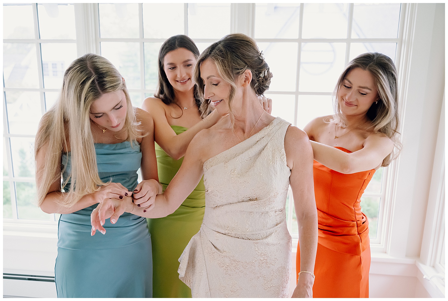 bride and daughters getting ready in bridal suite
